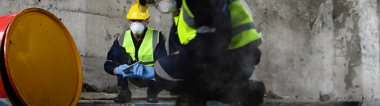 Two Officers of Environmental Engineering Wearing Protective Equipment