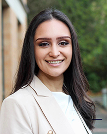 A professional headshot of Yasmine Robles, of Denfeld Lab