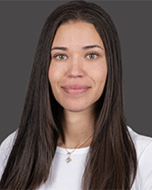 A smiling headshot of Nina Stutsman, of Denfeld Lab