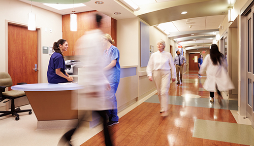 Busy Nurse's Station In Modern Hospital