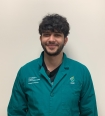 Man wearing green coat