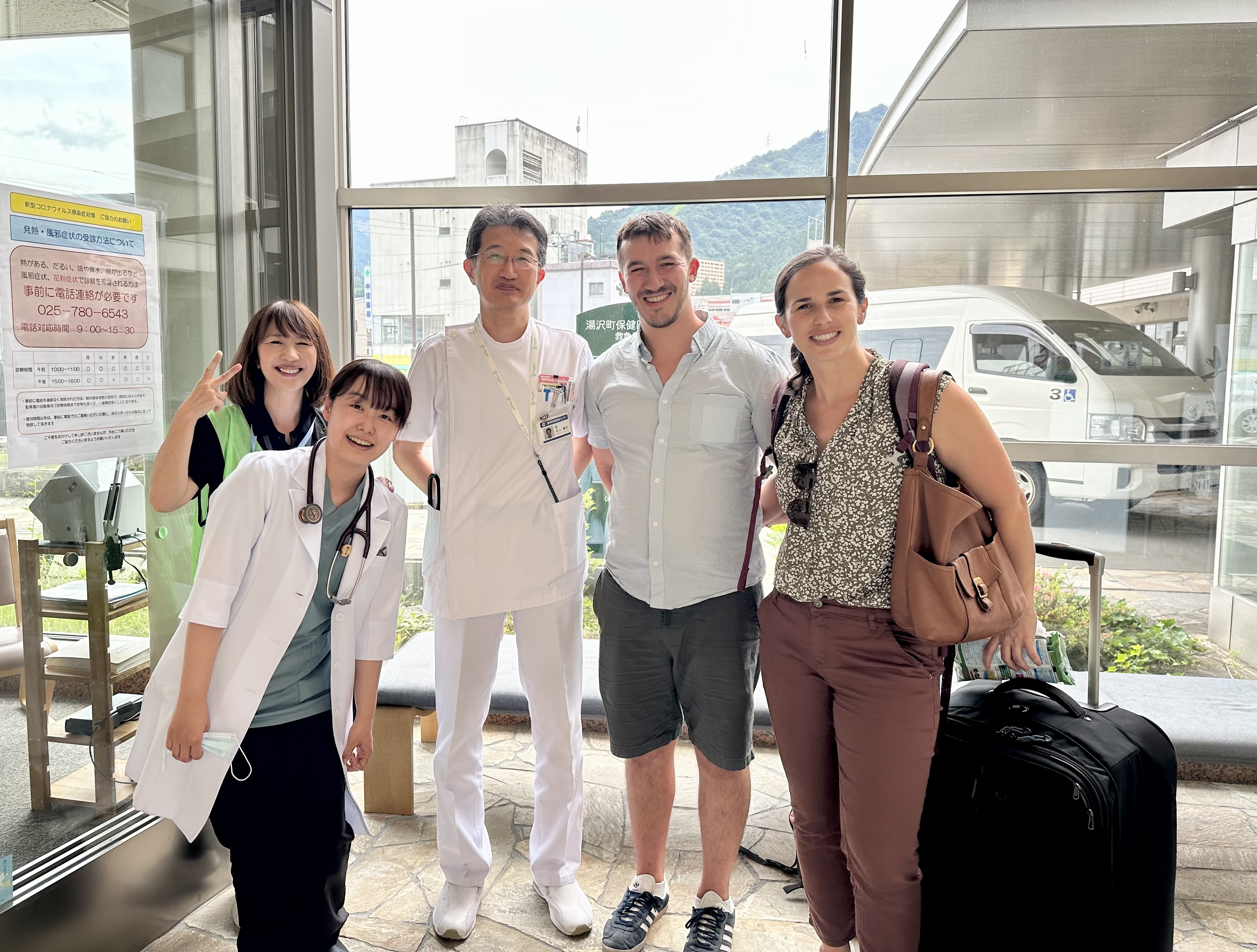A group of people smiling