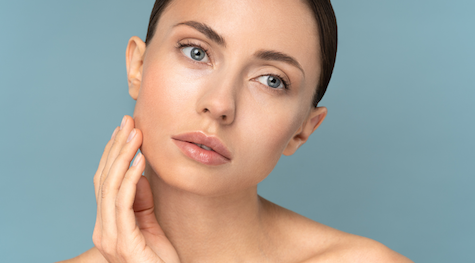 woman posing with rejuvenated skin