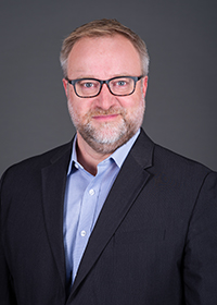 A professional photo of Kristian Enestvedt, M.D.