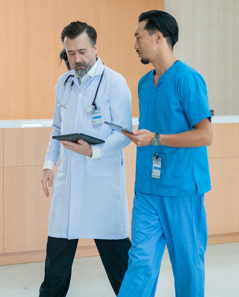 Doctor and nurse talking.