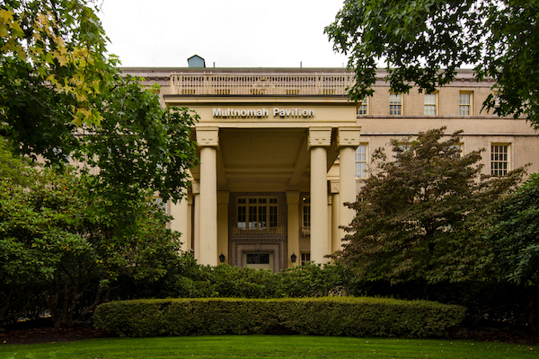 Building with columns surrounded by greenery Building with columns surrounded by greenery