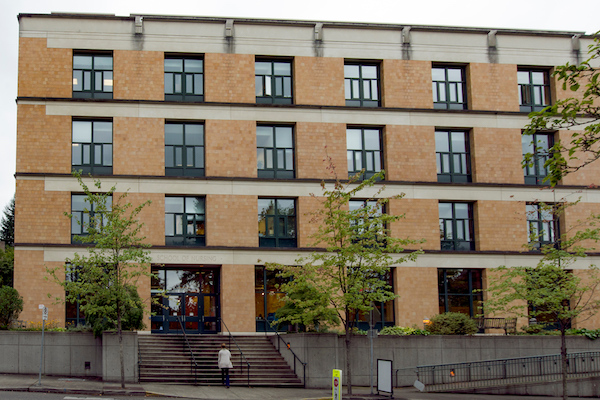 Square building with windows and a staircase Square building with windows and a staircase
